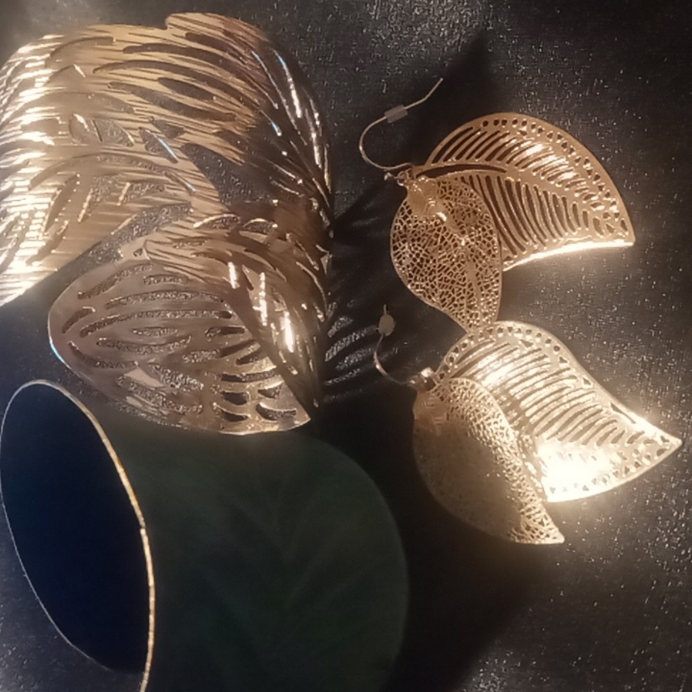 Two tropical leaf cuff brackets and earrings.